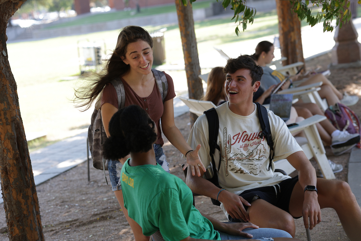 Students talk between classes on Baylor's beautiful campus.