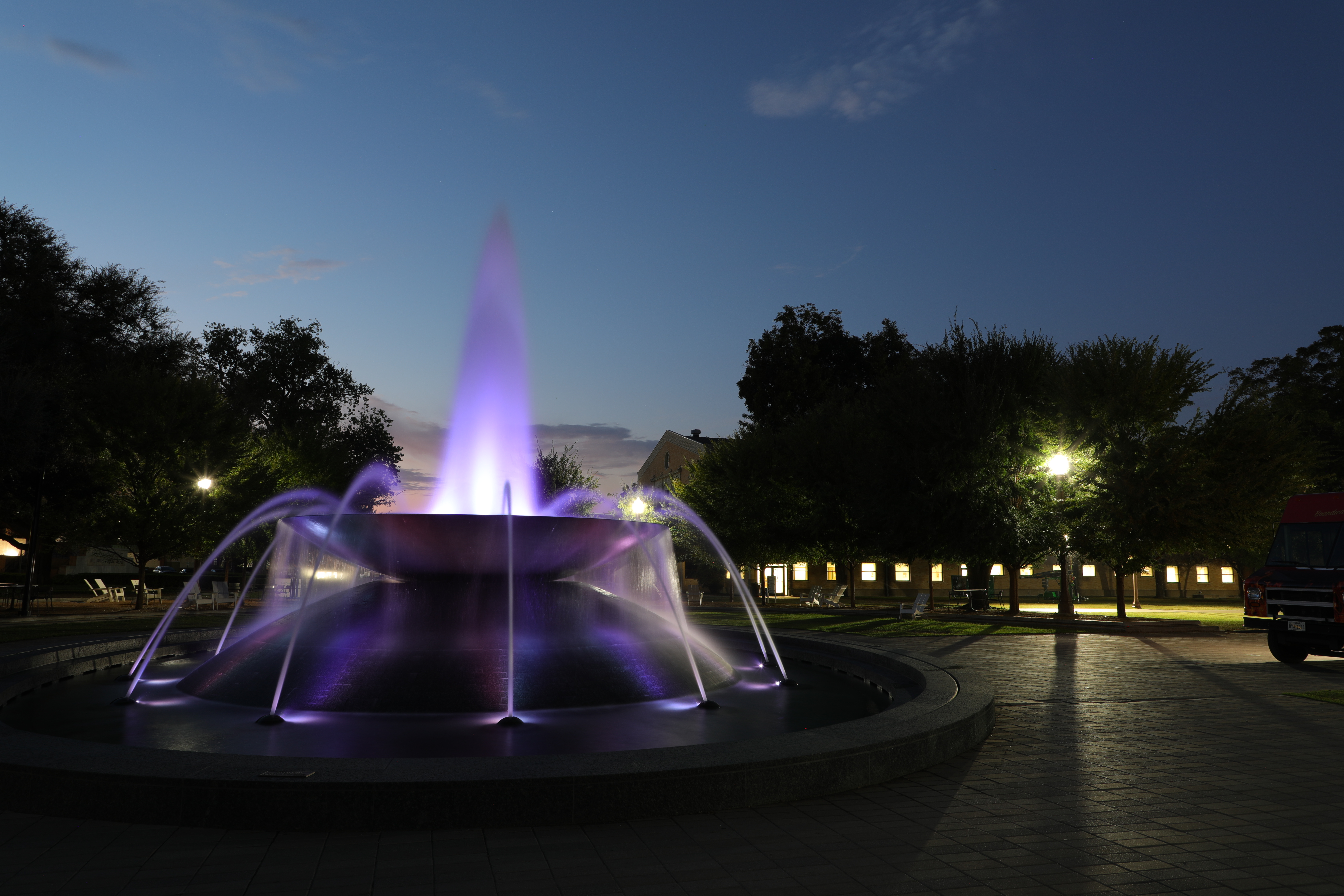 Rosenbalm Fountain lit purple in honor of Domestic Violence Awareness month.