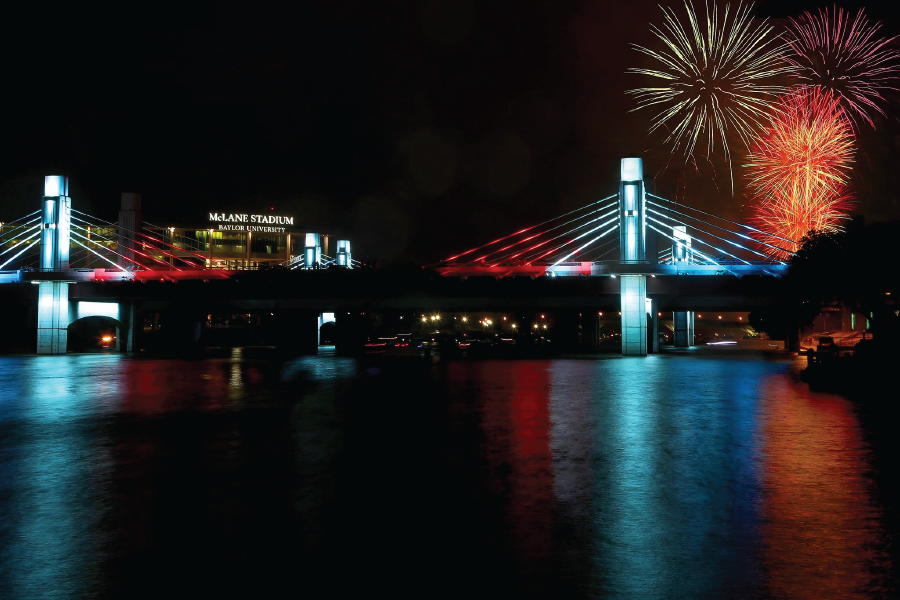 Photo of fireworks over the suspension bridge over the Brazos in Waco 